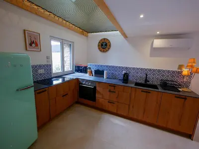 Cuisine ou kitchenette dans l'établissement Gîte de Saint Marcel