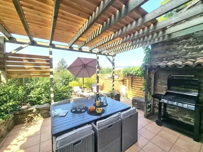 Barbecue disponible mis à disposition des clients de la maison de vacances