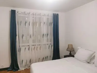 Un ou plusieurs lits dans un hébergement de l'établissement Appartement meublés à Villeurbanne Lyon