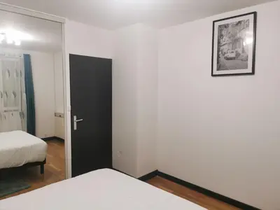 Un ou plusieurs lits dans un hébergement de l'établissement Appartement meublés à Villeurbanne Lyon