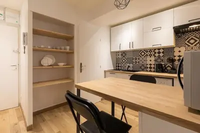 Cuisine ou kitchenette dans l'établissement Le Flesselles - Hyper centre - Calme et cosy