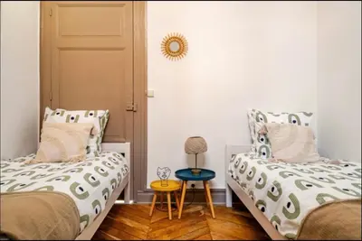 Un ou plusieurs lits dans un hébergement de l'établissement L'Escapade Bohême