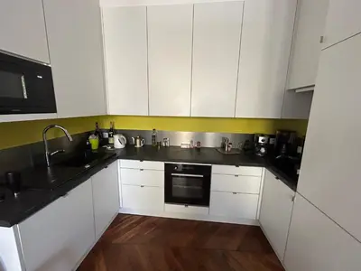 Cuisine ou kitchenette dans l'établissement Les 24 colonnes