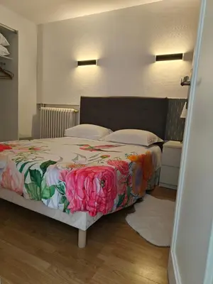 Un ou plusieurs lits dans un hébergement de l'établissement Le Cosy, Appartement Chaleureux 2 chambres