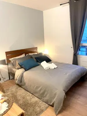 Un ou plusieurs lits dans un hébergement de l'établissement Studio Le Central 350 m de Gare Lyon Part-Dieu, Navette Stade et Arena ,Eurexpo Aéroport- Bus Direct Centre Ville