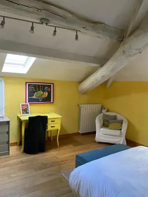 Un ou plusieurs lits dans un hébergement de l'établissement Le Clos Fanny chambre d’hôtes