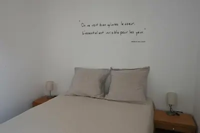 Un ou plusieurs lits dans un hébergement de l'établissement Appartement Les Trois Renards-Tassin
