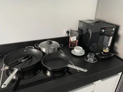 Cuisine ou kitchenette dans l'établissement Unique! jacuzzi privé 35°C + cinéma Villa entière