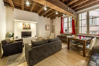 Coin salon dans l'établissement AllinLyon | Appartement familial au Vieux Lyon