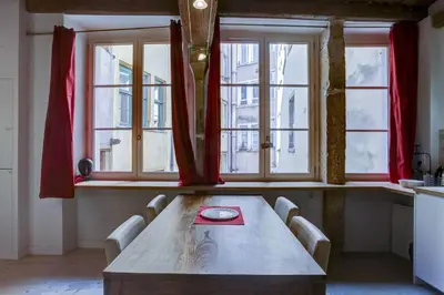 Un ou plusieurs lits dans un hébergement de l'établissement AllinLyon | Appartement familial au Vieux Lyon