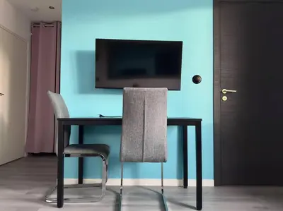 Télévision ou salle de divertissement dans l'établissement LE PUNTA CANA