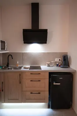 Cuisine ou kitchenette dans l'établissement L'expérience LOVE ROOM