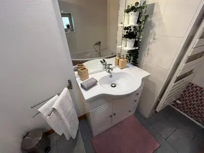 Salle de bains dans l'établissement Le Caladois