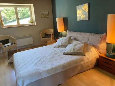 Un ou plusieurs lits dans un hébergement de l'établissement Calme et tranquillité à la campagne