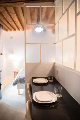 Un ou plusieurs lits dans un hébergement de l'établissement Sainte Hélène - Lovely high class studio