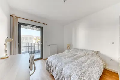 Un ou plusieurs lits dans un hébergement de l'établissement GuestReady - Charming getaway with a terrace