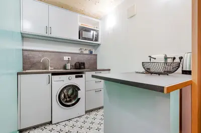 Cuisine ou kitchenette dans l'établissement Smartstay Louis Chazette - Proche Centre-ville
