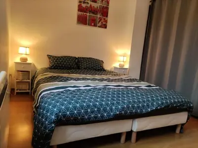 Un ou plusieurs lits dans un hébergement de l'établissement L'Atelier Cosy - Maison de village Atypique