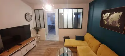 Télévision ou salle de divertissement dans l'établissement T3 cosy, calme & lumineux proche Eurexpo, Groupama