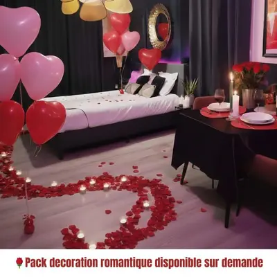 Un ou plusieurs lits dans un hébergement de l'établissement Suite Passion - Jacuzzi privé - Table massage