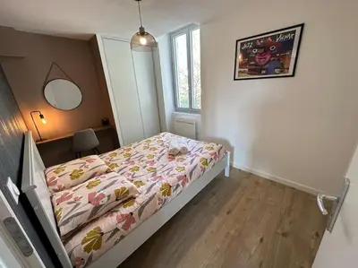Un ou plusieurs lits dans un hébergement de l'établissement Appartement JAZZ Vienne nord