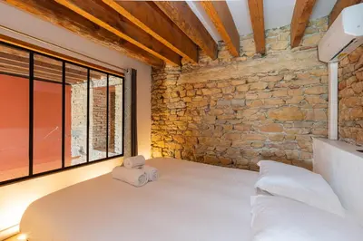 Un ou plusieurs lits dans un hébergement de l'établissement SmartStay Bird Family - Lyon