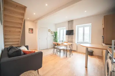 Télévision ou salle de divertissement dans l'établissement KASA SURF - Wifi TV & Cosy