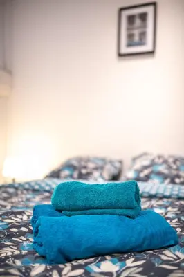 Un ou plusieurs lits dans un hébergement de l'établissement KASA LORETTE - WIFI - TV - 2 chambres