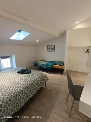 Un ou plusieurs lits dans un hébergement de l'établissement KASA LORETTE - WIFI - TV - 2 chambres