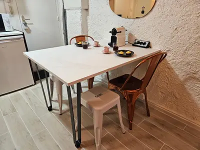 Cuisine ou kitchenette dans l'établissement Suite charmante proche du temple romain