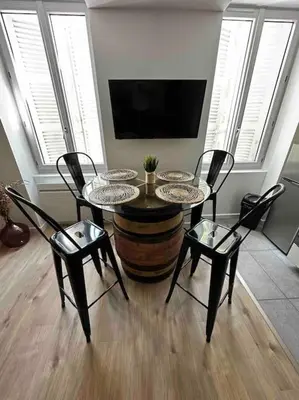 Télévision ou salle de divertissement dans l'établissement Appartement Vignes 2 personnes