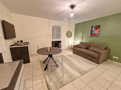 Coin salon dans l'établissement Appartement ZEN