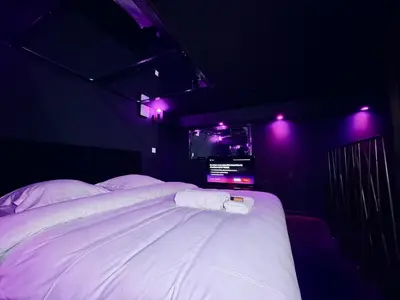 Un ou plusieurs lits dans un hébergement de l'établissement Love Room - Dayan 1
