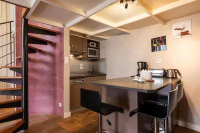 Cuisine ou kitchenette dans l'établissement DIFY Tour Rose