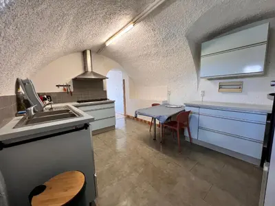 Cuisine ou kitchenette dans l'établissement Le Gîte du Port