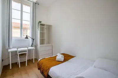Un ou plusieurs lits dans un hébergement de l'établissement Appartement 2 chambres, calme garanti