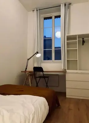 Un ou plusieurs lits dans un hébergement de l'établissement Appartement 2 chambres, calme garanti