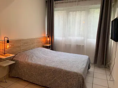 Un ou plusieurs lits dans un hébergement de l'établissement Apt Lyon Flachet