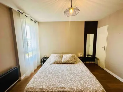 Un ou plusieurs lits dans un hébergement de l'établissement Appartement lumineux et spacieux proche gare