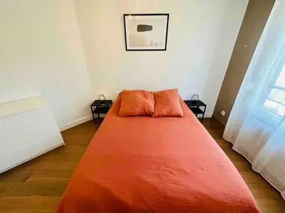 Un ou plusieurs lits dans un hébergement de l'établissement Appartement lumineux et spacieux proche gare