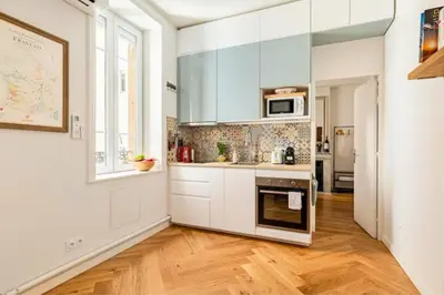 Cuisine ou kitchenette dans l'établissement Nid de calme centrale climatisé