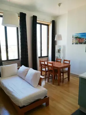 Coin salon dans l'établissement Le Rhône à vos pieds, Bellecour à quelques pas