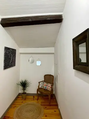 Coin salon dans l'établissement Maison au coeur de la Dombes