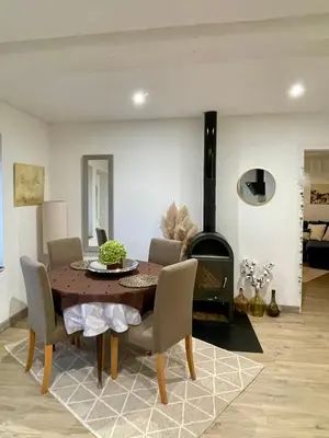 Coin salon dans l'établissement Maison au coeur de la Dombes