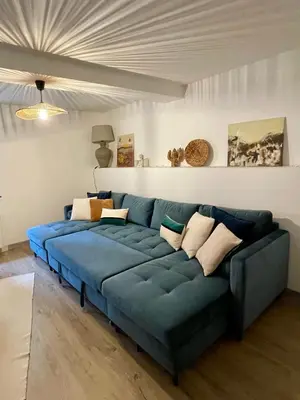 Coin salon dans l'établissement Maison au coeur de la Dombes