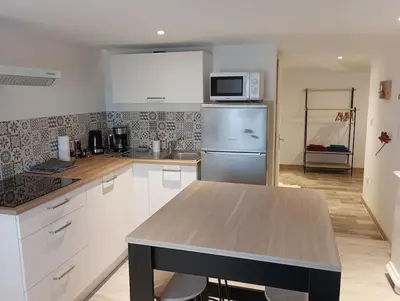 Cuisine ou kitchenette dans l'établissement Chez Rémi
