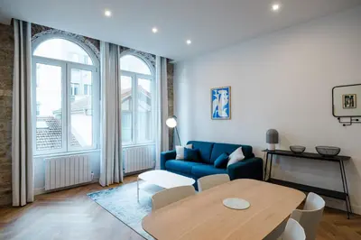 Coin salon dans l'établissement All in Lyon | T2 design & climatisé – Centre