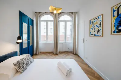 Un ou plusieurs lits dans un hébergement de l'établissement All in Lyon | T2 design & climatisé – Centre