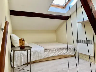 Un ou plusieurs lits dans un hébergement de l'établissement Suite Jason Appartement 4 personnes - Check in h24 & Wifi