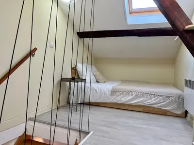 Un ou plusieurs lits dans un hébergement de l'établissement Suite Jason Appartement 4 personnes - Check in h24 & Wifi
